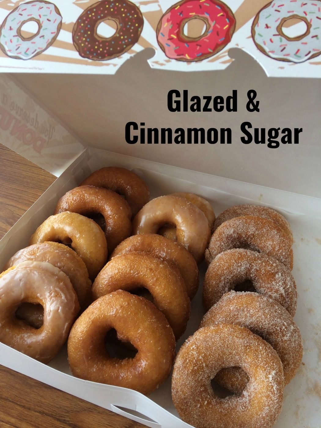 Box of glazed and cinnamon sugar donuts