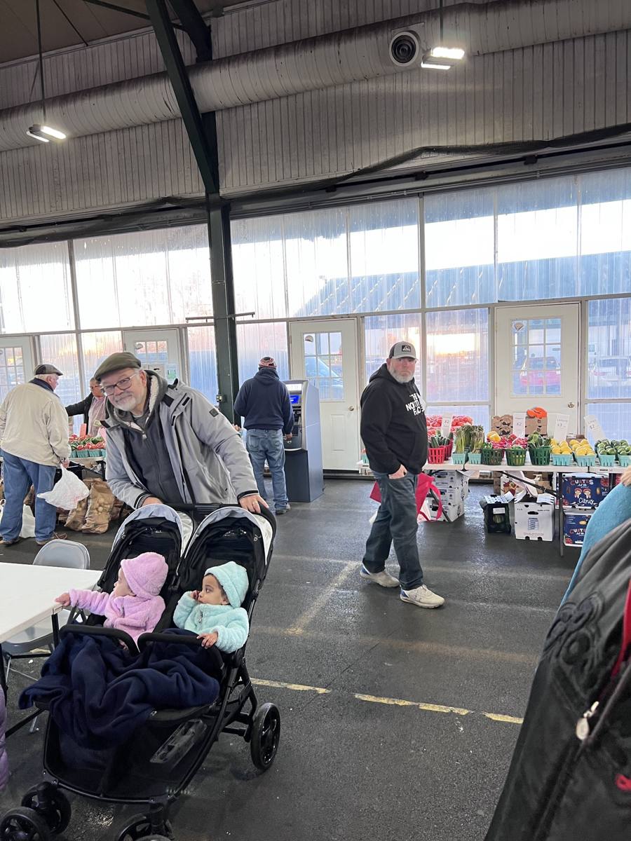 Shoppers inside the heated C Shed in winter